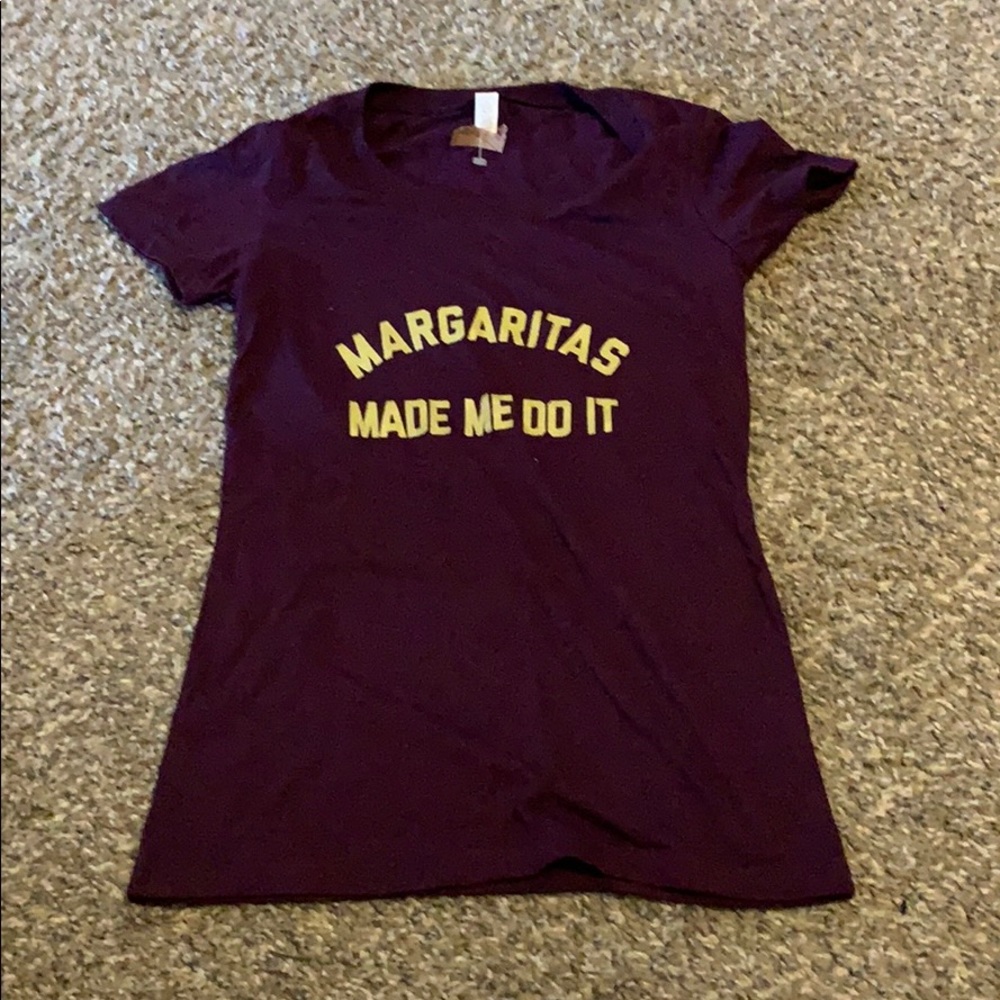 Dark purple shirt with gold lettering
